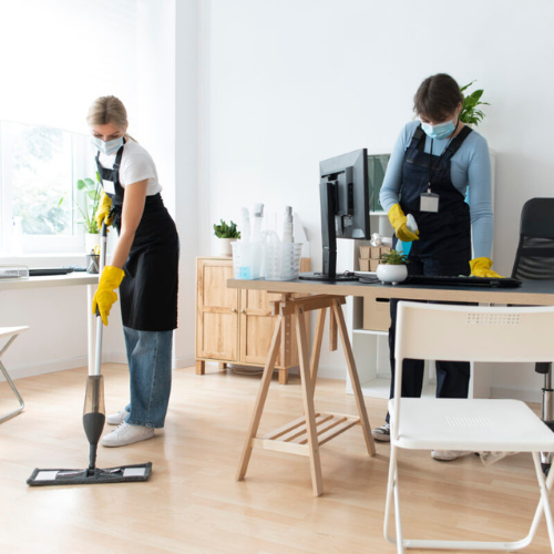 women cleaning common area